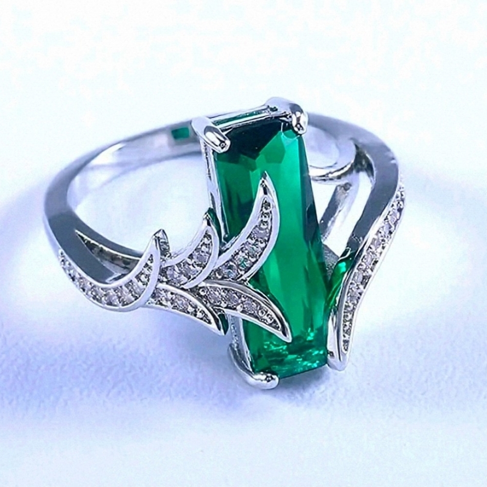 Elegant Silver and Emerald Green Gemstone Fashion Ring. CZ Accents. Size 9